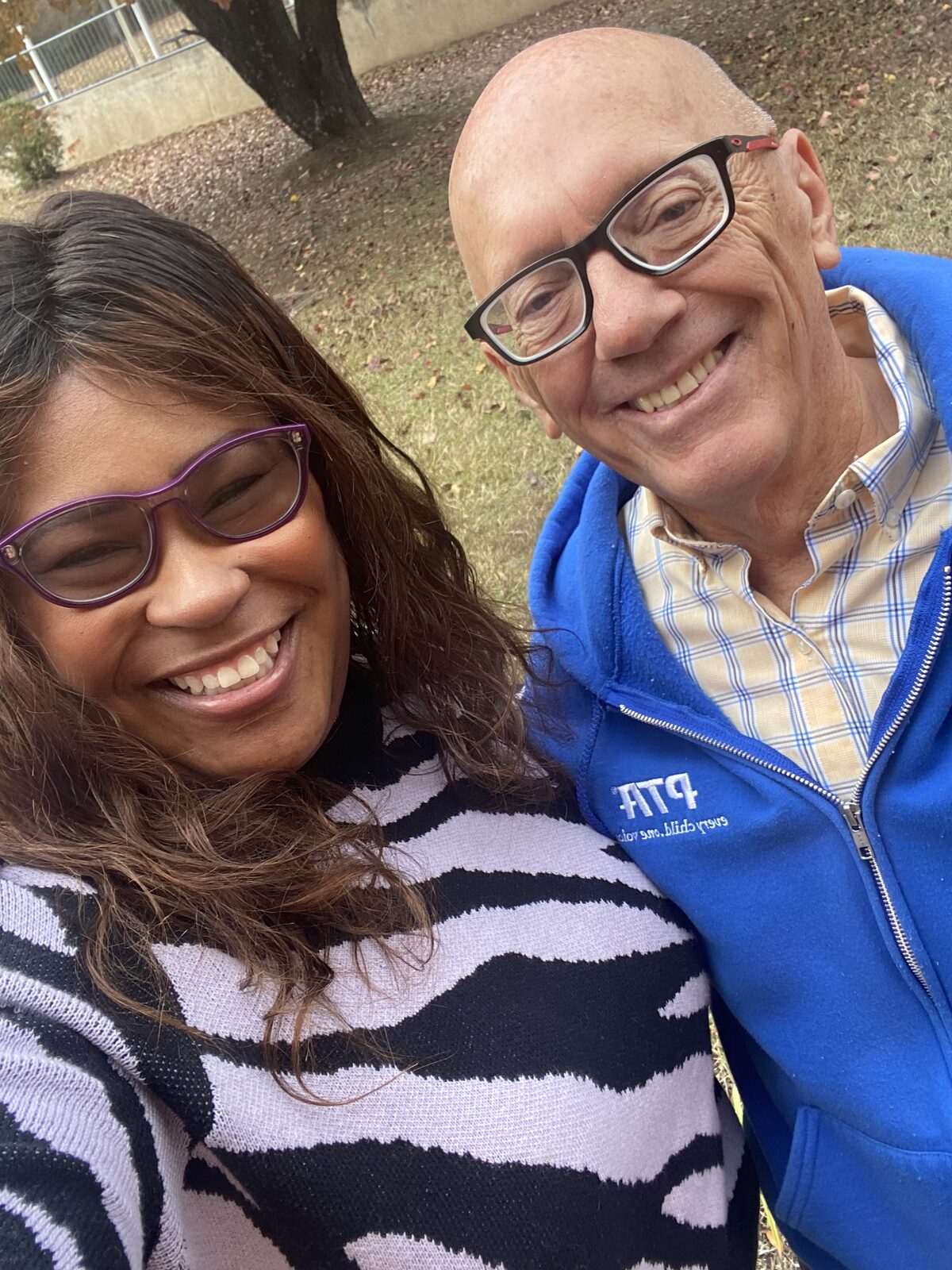 Natalie James with a PTA volunteer outside a Little Rock school