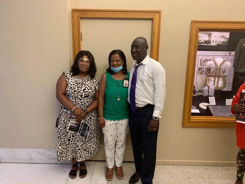 Natalie James with civil rights attorney Ben Crump and a community advocate