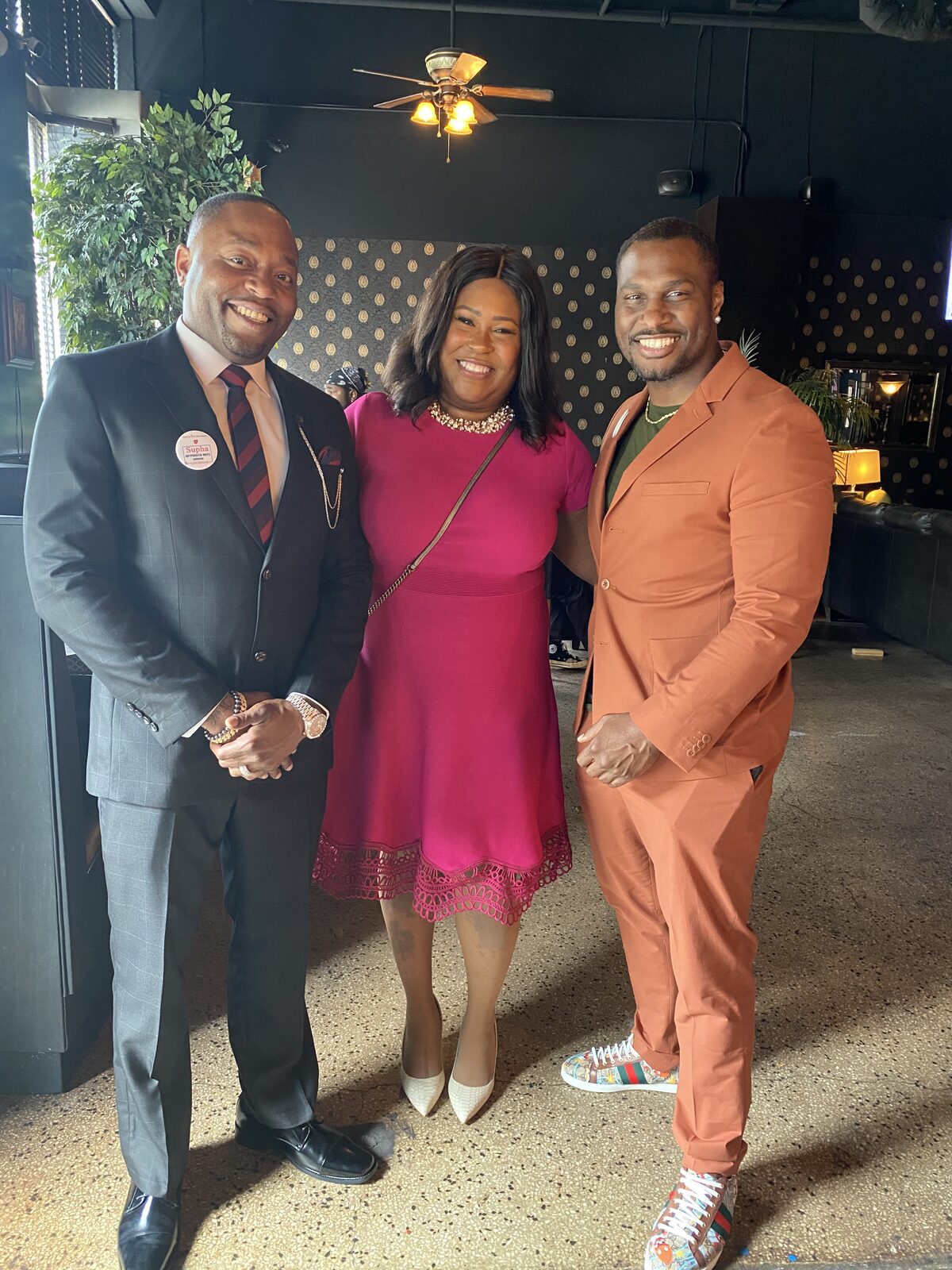 Natalie James with two community leaders at an Arkansas awards banquet