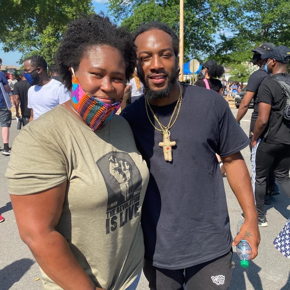 Natalie James at a 2020 march in Little Rock alongside a fellow marcher